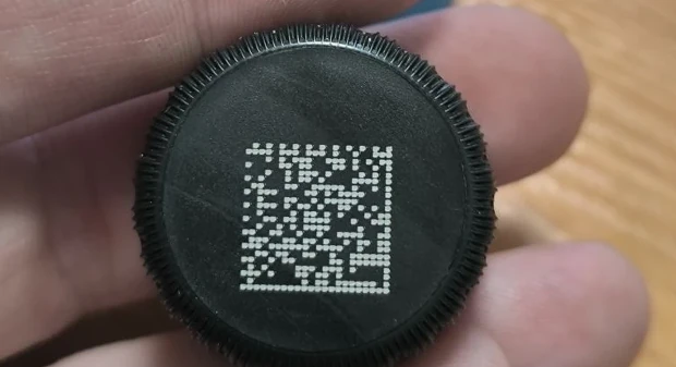 Caps on the conveyor after coding
