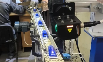 Laser unit above the conveyor with tubes